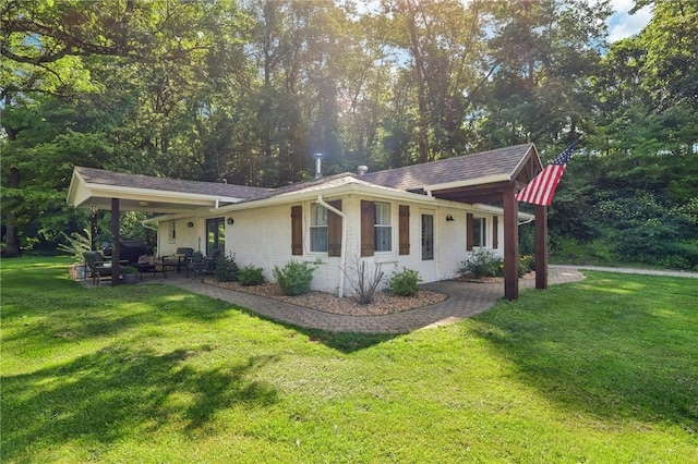 476 Trees Mills Rd, Salem Twp, PA 15601 - view of property exterior featuring a yard, a patio, and an outdoor living space