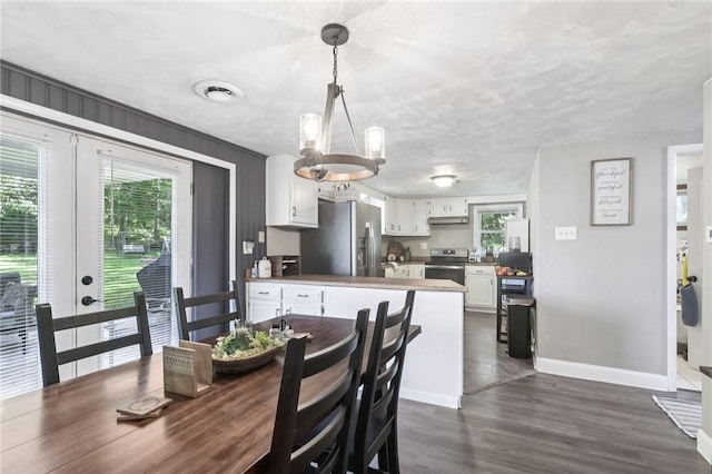 476 Trees Mills Rd, Salem Twp, PA 15601 - dining space featuring a chandelier, plenty of natural light, dark wood finished floors, and french doors