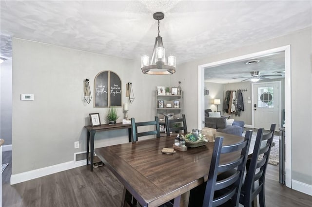 476 Trees Mills Rd, Salem Twp, PA 15601 - dining area featuring dark wood finished floors, a chandelier, and a ceiling fan