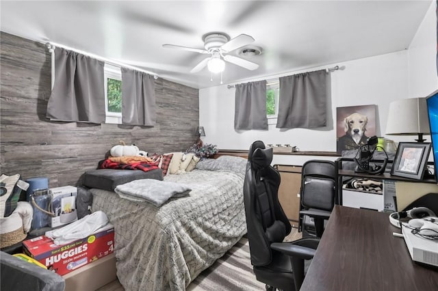 476 Trees Mills Rd, Salem Twp, PA 15601 - bedroom with a desk, a ceiling fan, and wooden walls