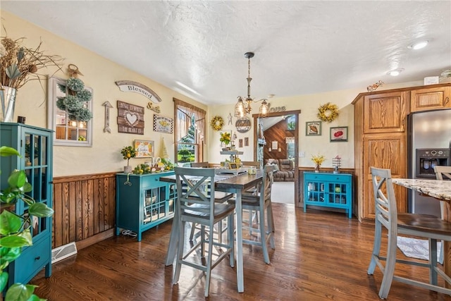 227 Holly Pl, Mount Pleasant Twp Wml, PA 15666 - dining space featuring dark wood-type flooring and a textured ceiling