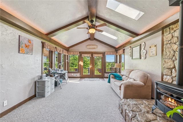 227 Holly Pl, Mount Pleasant Twp Wml, PA 15666 - sunroom / solarium with french doors, a skylight, and a wood stove