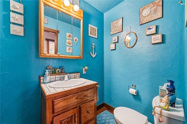 227 Holly Pl, Mount Pleasant Twp Wml, PA 15666 - bathroom with vanity and wood finished floors
