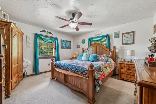 227 Holly Pl, Mount Pleasant Twp Wml, PA 15666 - bedroom with light colored carpet, a ceiling fan, and a textured ceiling