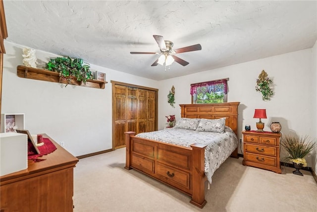 227 Holly Pl, Mount Pleasant Twp Wml, PA 15666 - bedroom featuring light carpet, a closet, and a ceiling fan