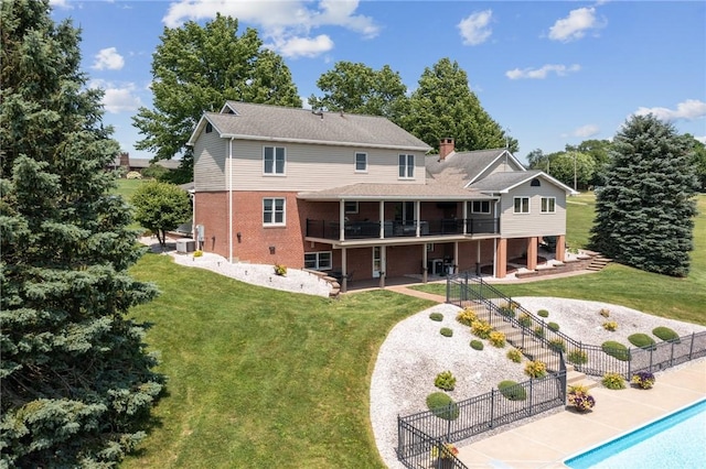 401 Pittsburgh St, Derry Twp, PA 15671 - rear view of property featuring brick siding, a deck, a patio, and stairway