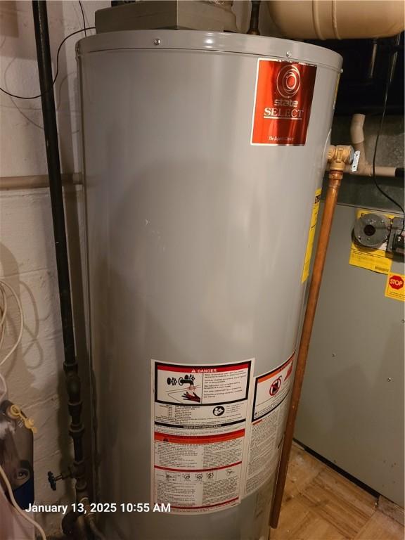 3381 Columbia Dr, Castle Shannon, PA 15234 - utility room with gas water heater