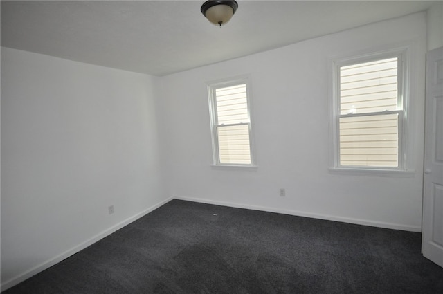 16 4th St, Sharpsburg, PA 15215 - unfurnished room with dark carpet and baseboards