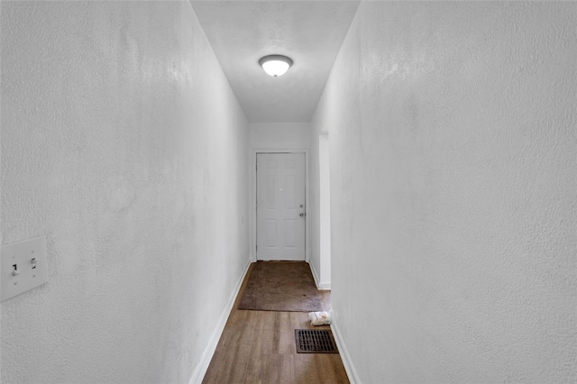16 4th St, Sharpsburg, PA 15215 - corridor featuring wood finished floors and a textured wall