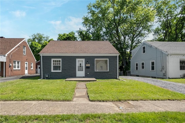 125 Carroll St, Aliquippa, PA 15001 - bungalow-style house featuring a front lawn and stone siding