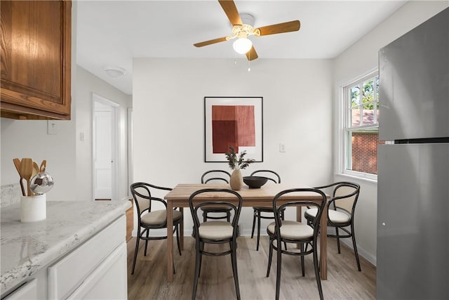 125 Carroll St, Aliquippa, PA 15001 - dining room with light wood finished floors and a ceiling fan