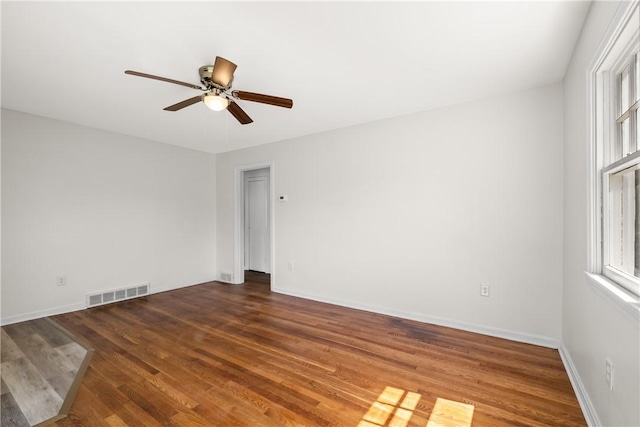 125 Carroll St, Aliquippa, PA 15001 - unfurnished room with ceiling fan, wood finished floors, and plenty of natural light