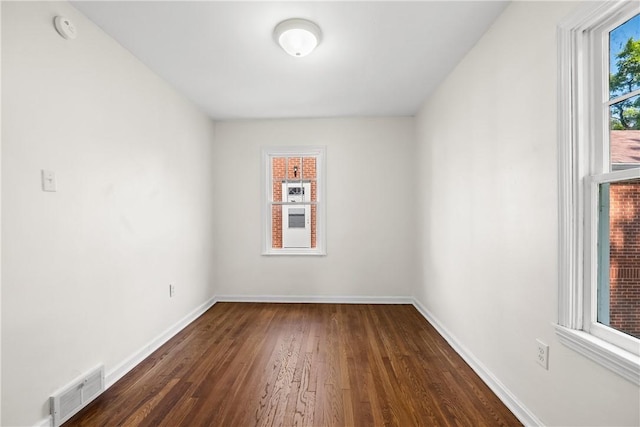 125 Carroll St, Aliquippa, PA 15001 - spare room with dark wood-style flooring and a smoke detector