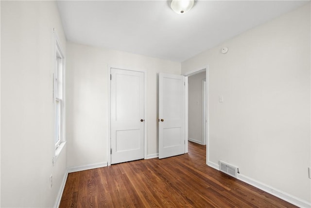 125 Carroll St, Aliquippa, PA 15001 - unfurnished bedroom featuring wood finished floors and baseboards