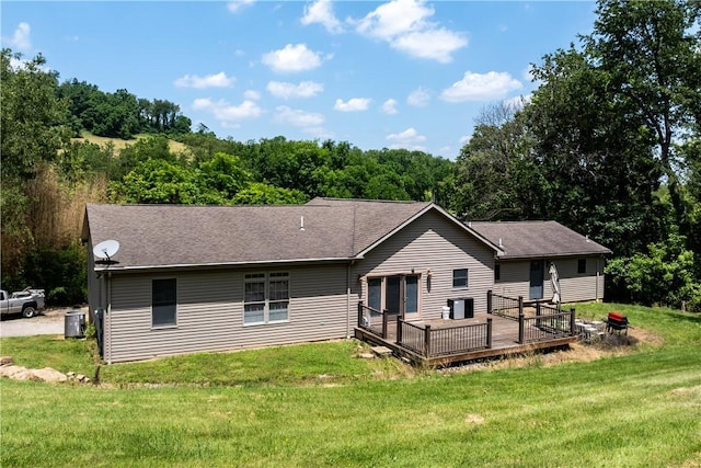 207 Linden Rd, North Strabane, PA 15317 - back of property with a deck, a lawn, a shingled roof, and a view of trees