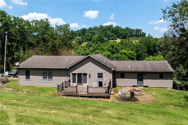 207 Linden Rd, North Strabane, PA 15317 - back of house with a wooden deck, a yard, and a view of trees