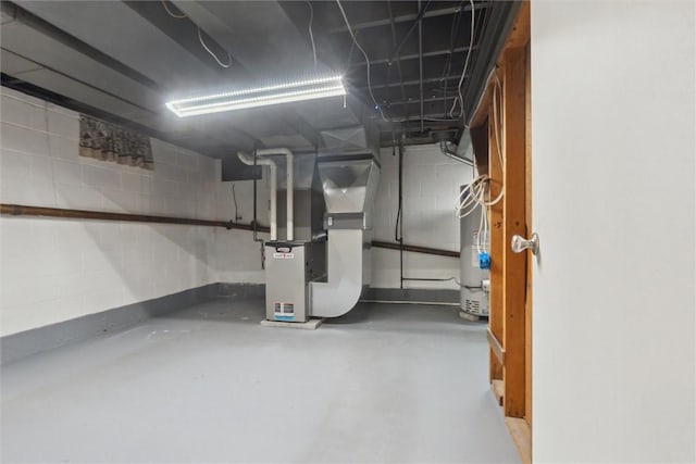 410 Blackhawk Rd, Chippewa Twp, PA 15010 - unfinished below grade area featuring heating unit and strapped water heater
