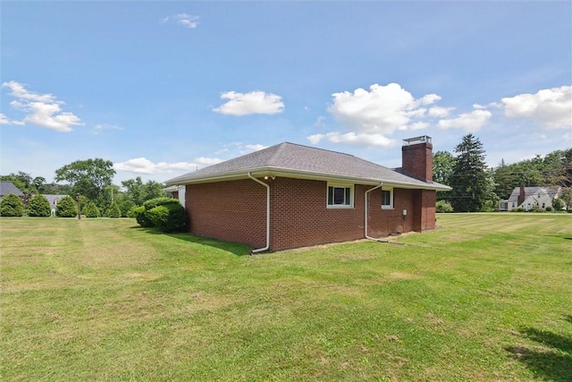 410 Blackhawk Rd, Chippewa Twp, PA 15010 - view of side of property with brick siding, a chimney, and a lawn