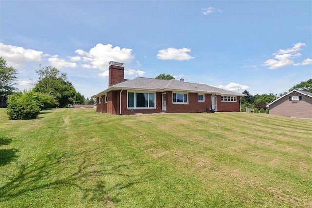 410 Blackhawk Rd, Chippewa Twp, PA 15010 - rear view of house featuring brick siding, a chimney, and a lawn