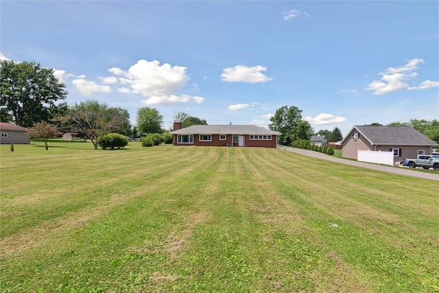 410 Blackhawk Rd, Chippewa Twp, PA 15010 - view of front of property featuring driveway, a front yard, and an attached garage