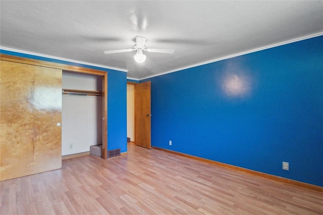410 Blackhawk Rd, Chippewa Twp, PA 15010 - unfurnished bedroom featuring wood finished floors, crown molding, a closet, and a ceiling fan