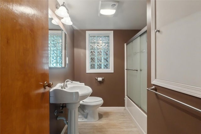 410 Blackhawk Rd, Chippewa Twp, PA 15010 - bathroom with wood finished floors and enclosed tub / shower combo