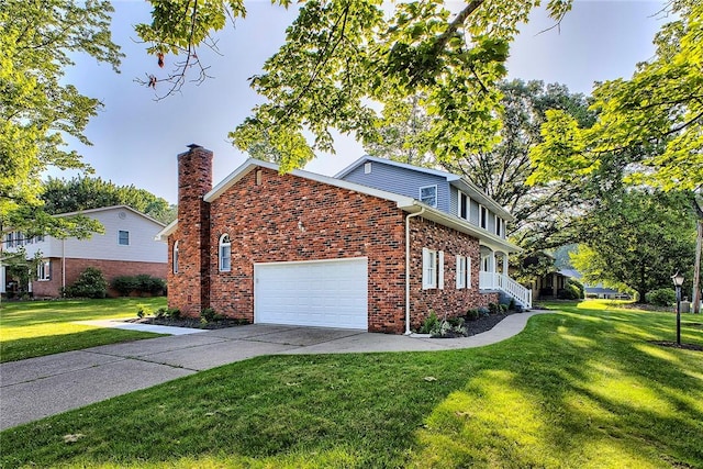 1318 Dellview Dr, Unity Twp, PA 15601 - view of side of home featuring a yard, driveway, a chimney, brick siding, and a garage
