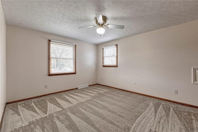 1318 Dellview Dr, Unity Twp, PA 15601 - carpeted empty room featuring a ceiling fan and a textured ceiling