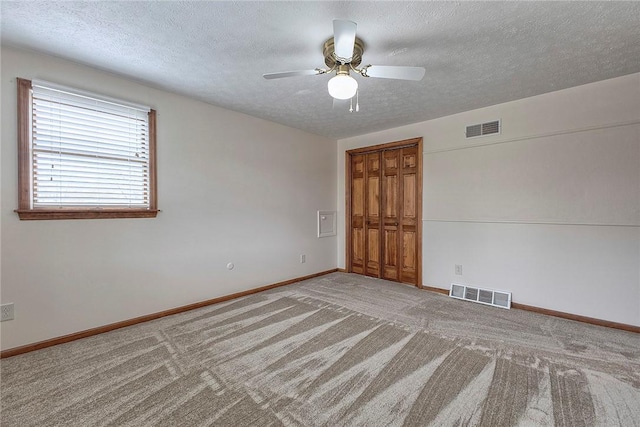 1318 Dellview Dr, Unity Twp, PA 15601 - carpeted spare room featuring a ceiling fan and a textured ceiling