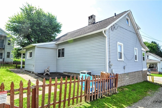 3411 York St, Mckeesport, PA 15132 - view of home's exterior featuring a chimney