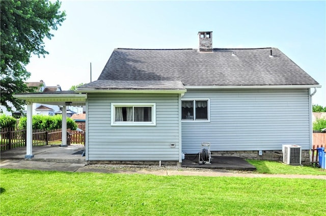 3411 York St, Mckeesport, PA 15132 - rear view of house with a patio, a chimney, and a shingled roof
