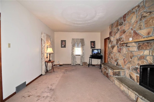 3411 York St, Mckeesport, PA 15132 - carpeted living room featuring a stone fireplace and baseboards