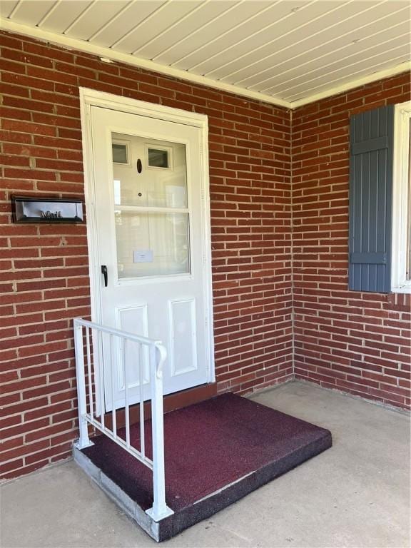 642 S 3rd St, Sharpsville, PA 16150 - property entrance featuring brick siding