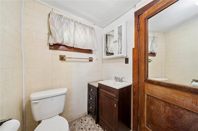 665 Stuchell Rd, Burrel/Blacklick, PA 15748 - bathroom with vanity, tile walls, and tile patterned floors