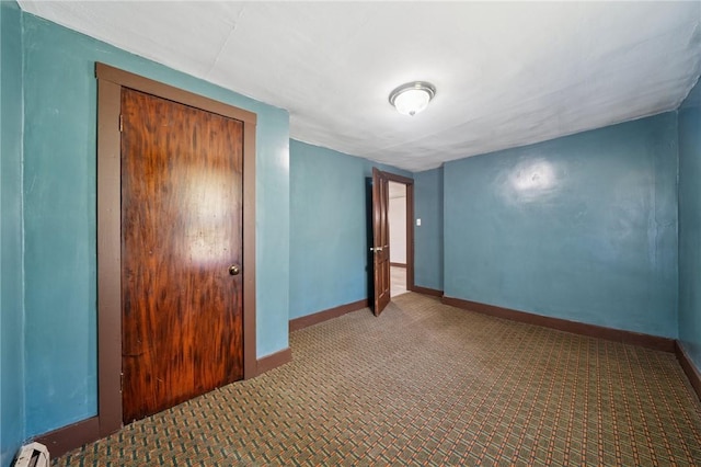 665 Stuchell Rd, Burrel/Blacklick, PA 15748 - unfurnished bedroom featuring baseboard heating and carpet floors