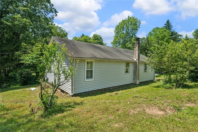 665 Stuchell Rd, Burrel/Blacklick, PA 15748 - view of home's exterior with a lawn and a chimney