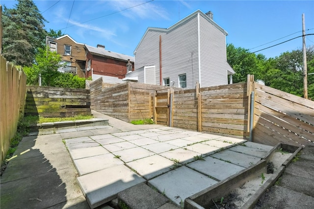 227 Henderson St, Fineview, PA 15212 - fenced backyard featuring a patio area