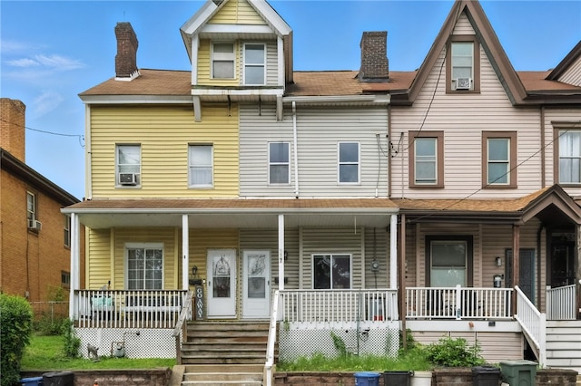 227 Henderson St, Fineview, PA 15212 - townhome / multi-family property with covered porch and a chimney