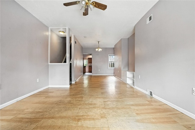 227 Henderson St, Fineview, PA 15212 - unfurnished living room featuring ceiling fan and baseboards