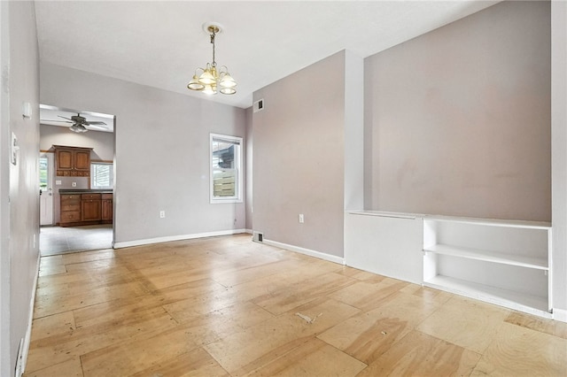 227 Henderson St, Fineview, PA 15212 - unfurnished room with light wood-style floors, a chandelier, and a ceiling fan