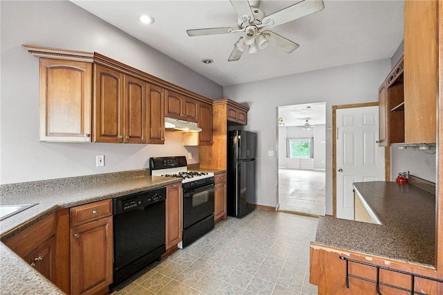 227 Henderson St, Fineview, PA 15212 - kitchen featuring black appliances, a ceiling fan, under cabinet range hood, brown cabinets, and recessed lighting