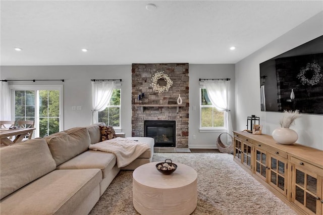 212 Bengal Fox, Jackson Twp, PA 16063 - living area with a stone fireplace, recessed lighting, and wood finished floors