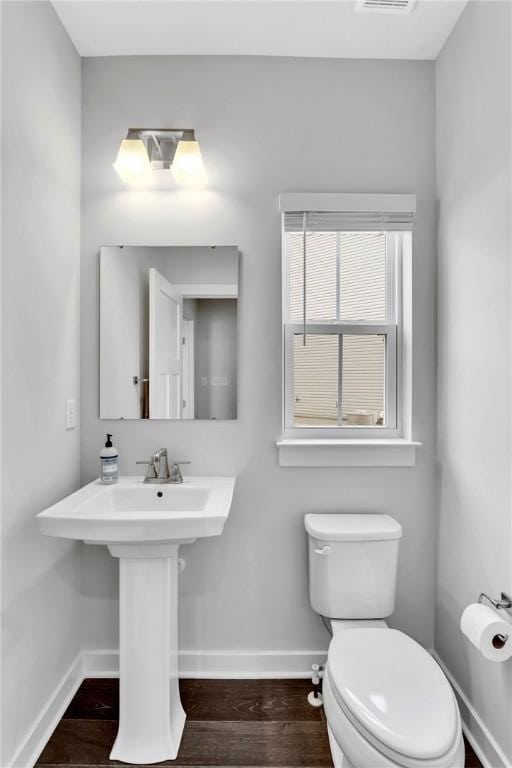 212 Bengal Fox, Jackson Twp, PA 16063 - half bathroom with baseboards and wood finished floors
