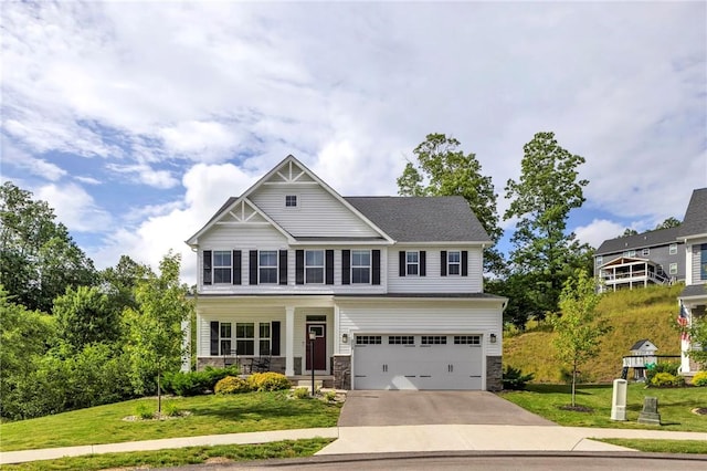 212 Bengal Fox, Jackson Twp, PA 16063 - craftsman house featuring covered porch, concrete driveway, stone siding, a garage, and a front lawn