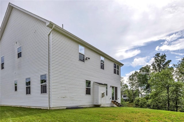 212 Bengal Fox, Jackson Twp, PA 16063 - back of property with a lawn and entry steps