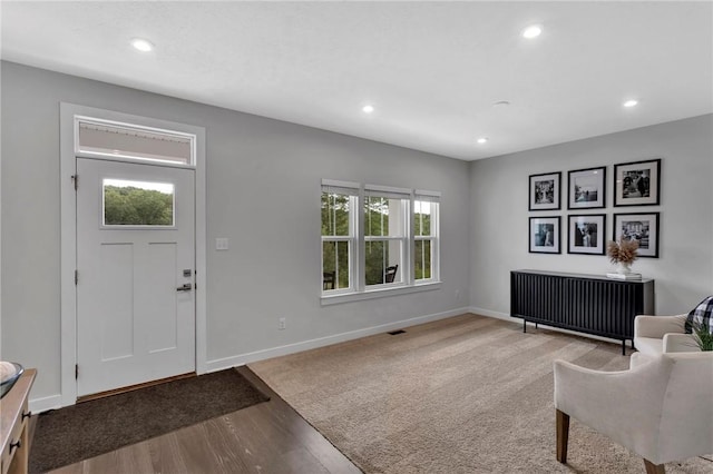 212 Bengal Fox, Jackson Twp, PA 16063 - foyer featuring recessed lighting, radiator, and wood finished floors