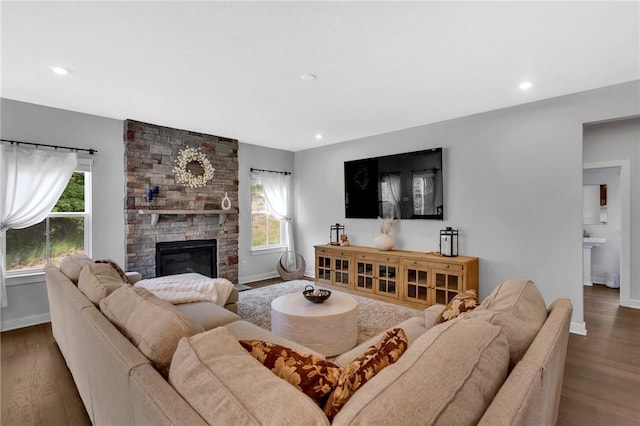 212 Bengal Fox, Jackson Twp, PA 16063 - living area with plenty of natural light, wood finished floors, a fireplace, and recessed lighting