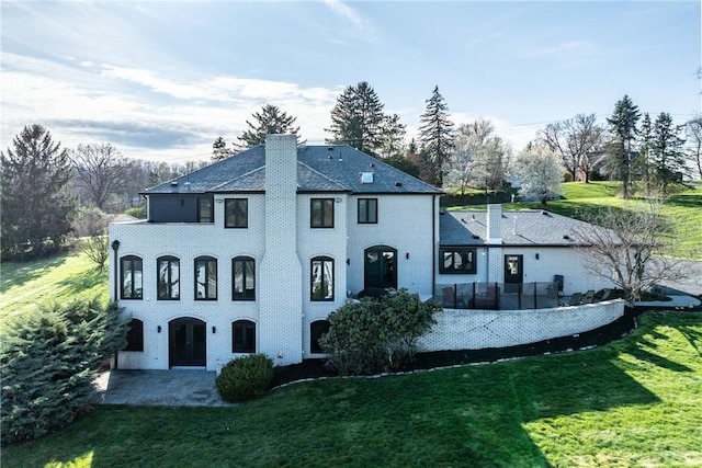 2460 Nicholson Rd, Franklin Park, PA 15143 - french country inspired facade with a front lawn, a chimney, and a patio area
