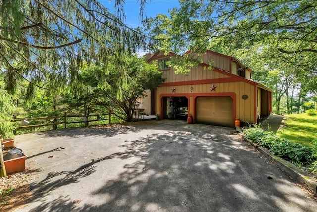 530 Perry Hwy, Lancaster Twp, PA 16037 - view of side of property featuring driveway and a garage
