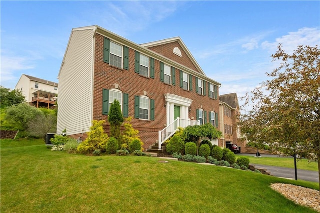 6412 Interlaken Dr, South Fayette, PA 15057 - view of front facade with a front lawn and brick siding